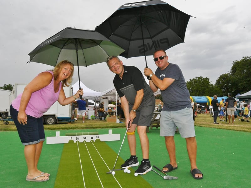 Golfers Ian Graham (centre) with Jenny and Andy Martin.
