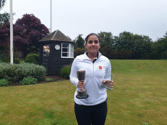 Maliha Mirza with her prize from the Northants County Championships