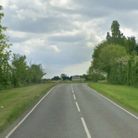 Driver arrested on suspicion of causing death by dangerous driving after motorcyclist dies in crash near Peterborough