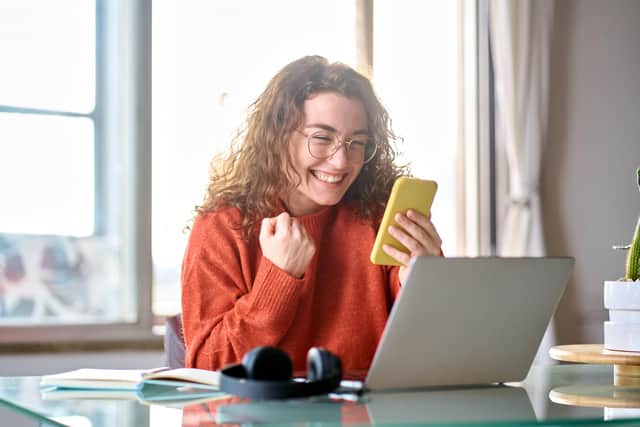The woman won a £100,000 jackpot on the National Lottery mobile phone app