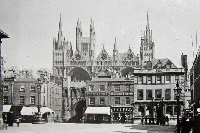 A Victorian glass slide image showing Market Place in the early 1890s. The Printing Office in the background was where the Peterborough Advertiser was founded and first produced in 1854.