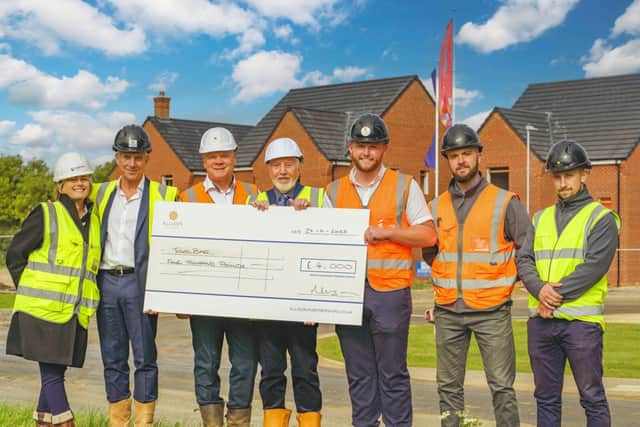 Cheque presented to Toolbar earlier this year, from Allison Homes 