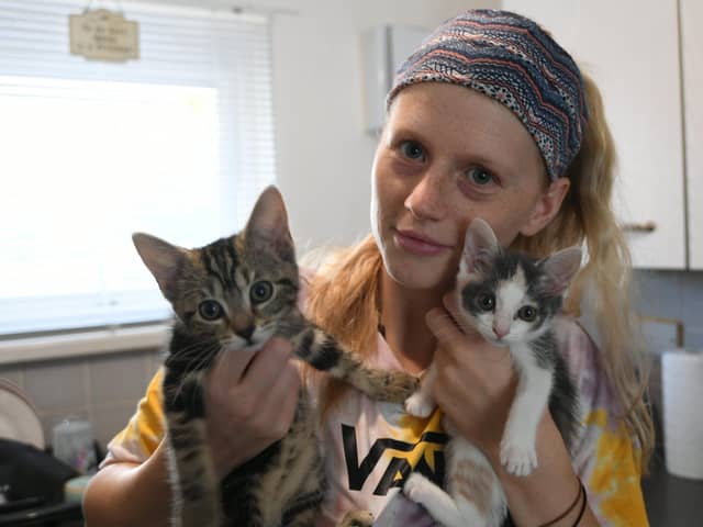 Jodie Wallace, from Herlington, with her kittens - who have caught some of the mice currently taking over her home.