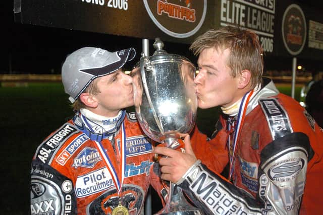 Hans Andersen (left) and Ulrich Ostergaard celebrate Panthers' 2006 Grand Final success.