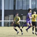 Action from the Senior Cup tie between Stanground Sports (purple) and Holbeach United Reserves. Photo: David Lowndes.