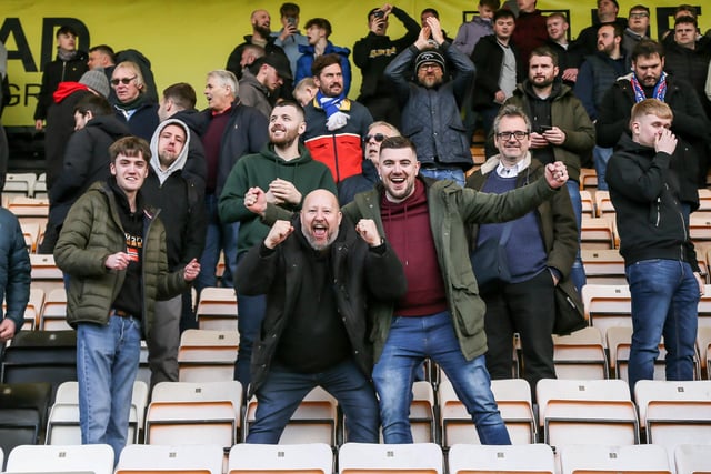 Peterborough United fans enjoy the win at Cambridge United.
