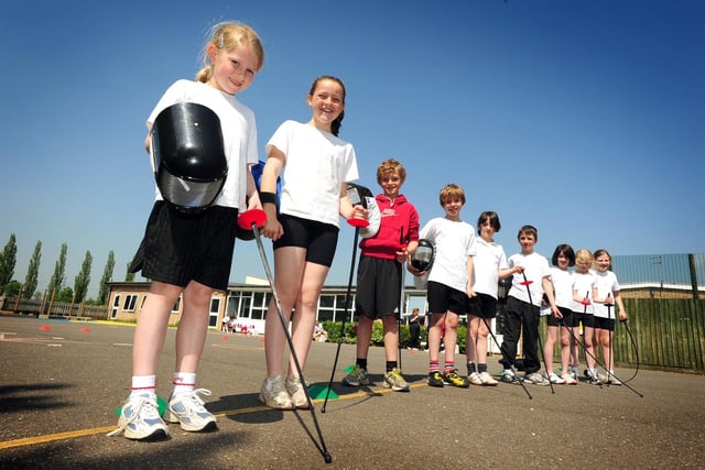 John Clare Primary School pupils take part in a fencing session as part of an Olympic-themed sports day.