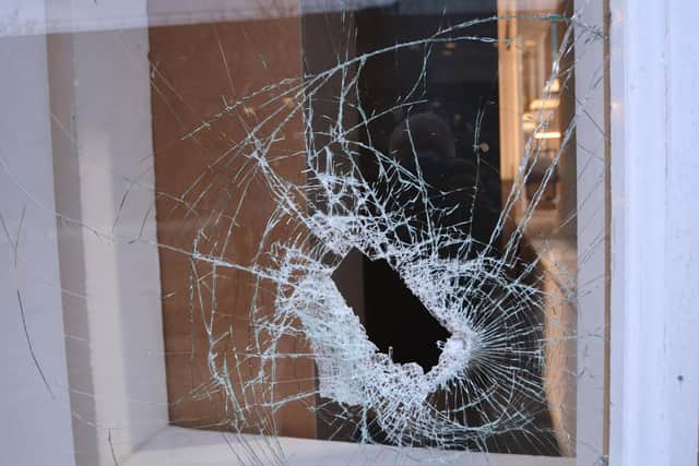 Smashed windows at Furniture on Budget in Rivergate.