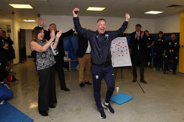 Posh boss Darren Ferguson celebrates promotion from League One at Doncaster in May, 2021. Photo: Joe Dent/theposh.com