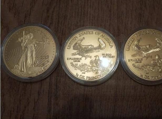 A total of 13 of the gold eagle coins have been reported stolen
