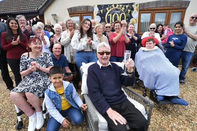 Bill Swann celebrates his 100th birthday with his neighbours at Thorpe Lea Road