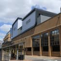 The exterior of the Empire cinema can be clearly seen on the roof of the Queensgate Shopping Centre.