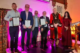 Community Involvement Award winners (l to r) Lewis Vernum, Malcolm Hopkins and representatives from the Faizen e Madinah Mosque pictured with Peterborough Mayor Cllr Nick Sandford and Cllr Shabina Qayyum.