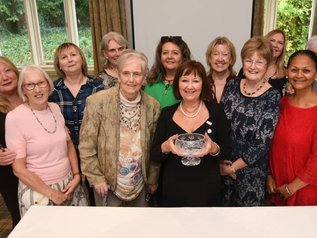President Annette Beeton and chairman Ann Hanson with fundraisers from Burghley Park and Peterborough Ladies for Cancer Research at their annual general meeting