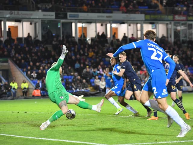 Hector Kyprianou heads the ball back across goal for Posh against Port Vale. Photo David Lowndes.