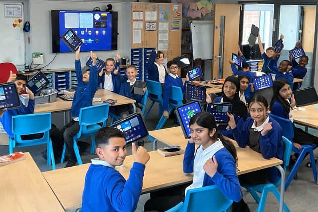 Pupils at Thorpe Primary with their new iPads