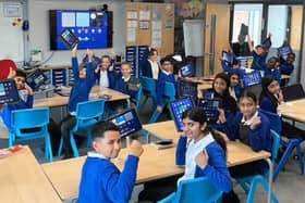 Pupils at Thorpe Primary with their new iPads