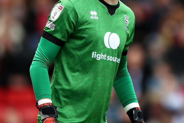 Age 20. Club West Brom. 77 League One appearances between Cheltenham and Lincoln City in the last two seasons and he's still only 20. Kept a clean sheet at Posh in a cup-tie for Cheltenham. Signed a four-year deal at the Hawthorns in 2021.