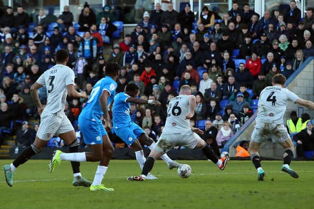 Kwame Poku of Peterborough United scores the winning goal against Exeter. Photo: Joe Dent/theposh.com