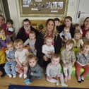 Staff and children at the Little Acorns baby and day nursery at Yaxley who received an outstanding OFSTED