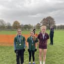 Inter girls winner Erin Walker (left) with medallists Sadie Hunter and Ruby Hynes