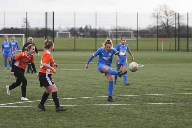 Katie Steward on her way to a hat-trick for Peterborough Sports Ladies against Burwell. Photo: Tim Symonds.