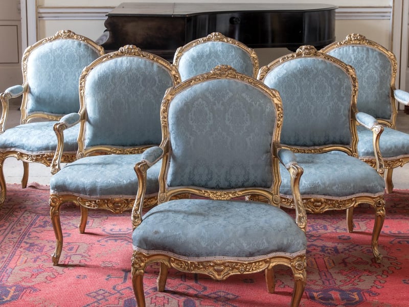 A suite of six French Louis XV gilt frame armchairs, from, the18th century - with an estimate of £10,000 - £15,000