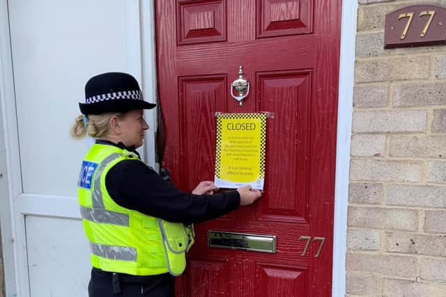 Police put up official closure notice at 77 Wharf Road, Woodston, Peterborough