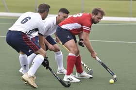 Joe Finding (red) scored for City of Peterborough in Banbury. Photo: David Lowndes.