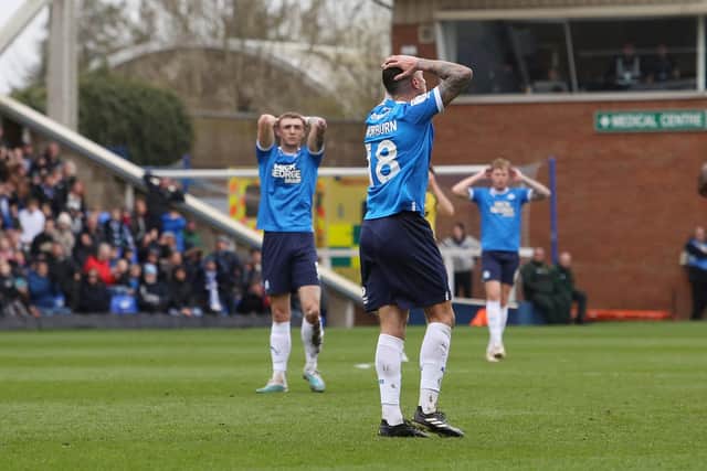 Oliver Norburn and Jack Taylor can't believe that Posh failed to beat Oxford. Photo: Joe Dent.