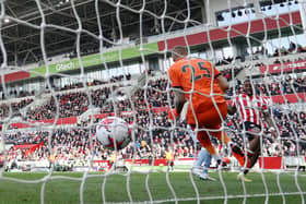 Ivan Toney scores for Brentford against Aston Villa. Photo by Ryan Pierse/Getty Images.