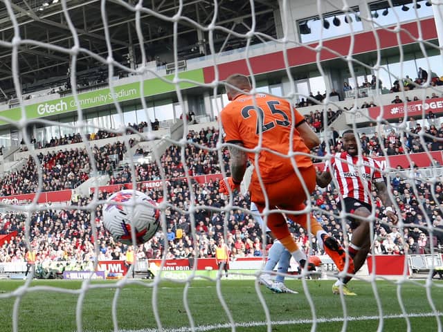 Ivan Toney scores for Brentford against Aston Villa. Photo by Ryan Pierse/Getty Images.