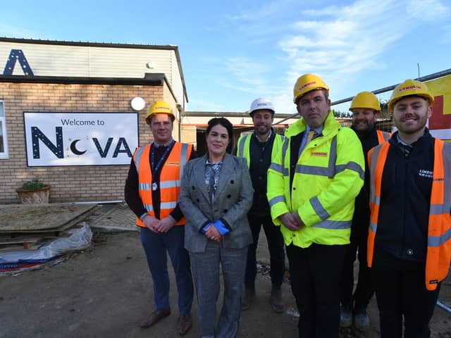 Building work taking place at Nova primary academy, Bretton. Head teacher Alma McGonigle with contractors Darren King and Louie Gittins and Martin Bloor from Lindum with John Currie from Edge and Bobbie Macguire from PKAT.