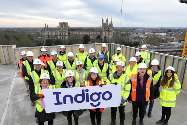 From left,  holding the Indigo sign board are Cross Keys Homes' chief executive Claire Higgins, CKH Group Board Chair Shelagh Grant, Cambridgeshire and Peterborough Combined Authority Deputy Mayor Cllr Anna Smith and Willmott Dixon’s Director Dan Doyle.