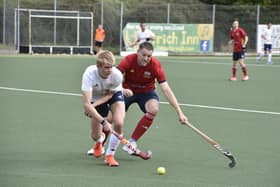 Gareth Andrew (red) scored a hat-trick for City of Peterborough at St Albans. Photo: David Lowndes.