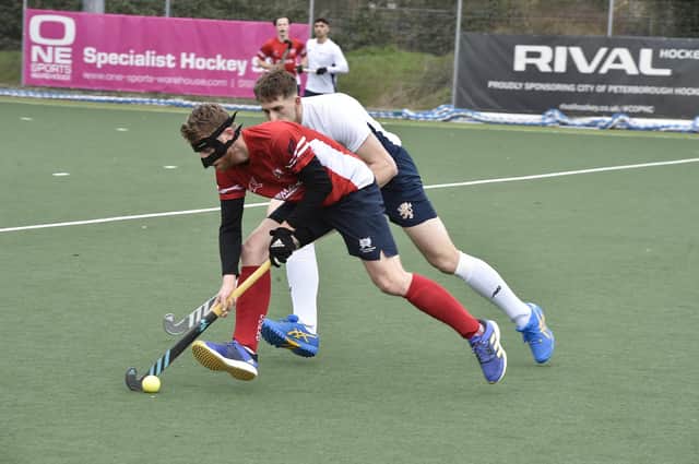 Action from City of Peterborough (red) v University of Birmingham seconds. Photo: David Lowndes.