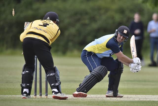 Burghley Park's Ben Woodward is stumped by Peterborough Town wicket-keeper Kyle Medcalf off the bowling of Karanpal Singh in the Stamford Shield FInal. Photo: David Lowndes.