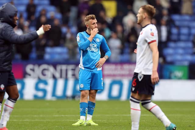 Posh full-back Sam Curtis shows his disappointment at the final whistle at Bolton. Photo Joe Dent/theposh.com.
