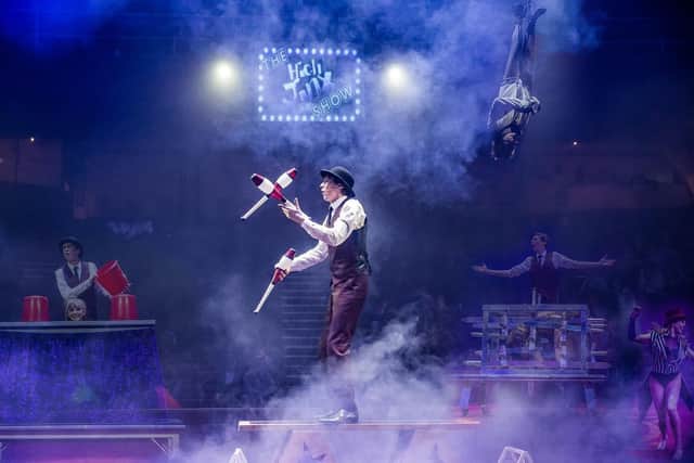 Magician, illusionist and escapologist Michael Jordan on stage.
Photo by Red Box Studios.