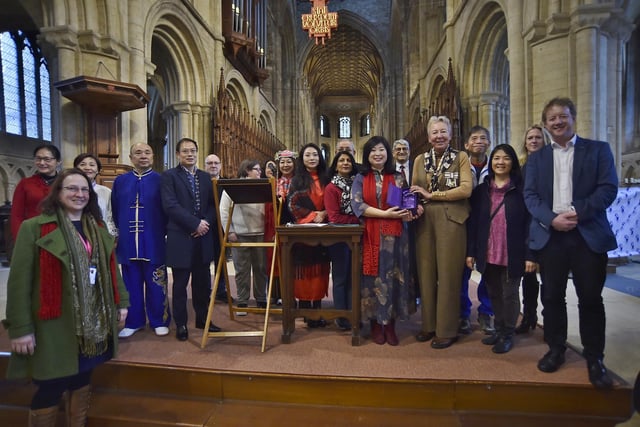 Lord Lt. Julie Spence with Faustina Yang receiving the King's Award for Voluntary Services at Peterborough Cathedral -  pictured with her volunteers