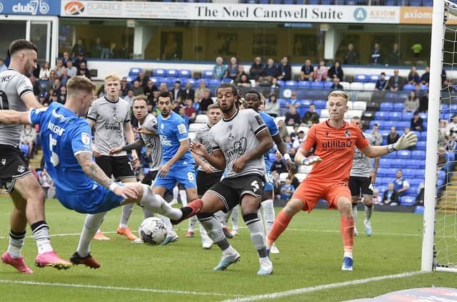 Josh Knight (near) in action for Posh against Bristol Rovers. Photo: David Lowndes.