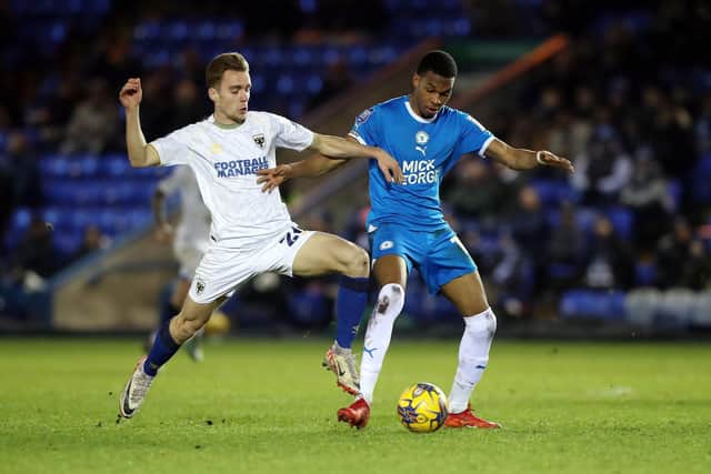 Malik Mothersille in action for Posh against AFC Wimbledon last season. Photo Joe Dent/theposh.com.