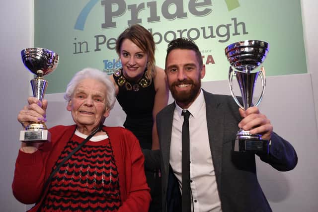 Win receiving her Pride of Peterborough award in 2015.