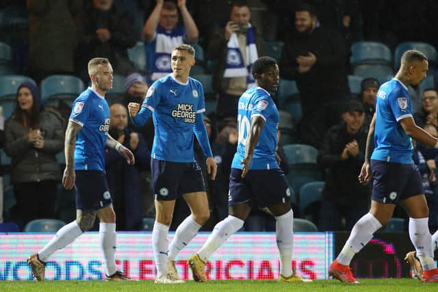 Jack Taylor (second left) of Peterborough United celebrates his goal against Barnsley. Photo: Joe Dent/theposh.com.