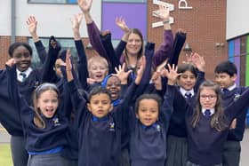 Headteacher Hannah Quinn celebrates with pupils