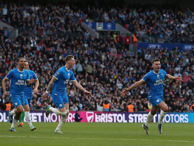 Harrison Burrows celebrates his winning goal at Wembley in the EFl Trophy Final.