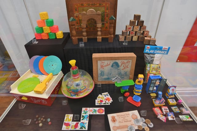 A collection of historic children's toys.