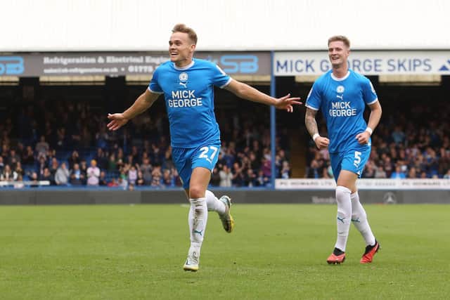 Archie Collins celebrates scoring his first goal for Peterborough United. Photo: Joe Dent.
