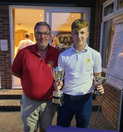 Milton club captain Peter Hostead with club champion Charlie Pearce.