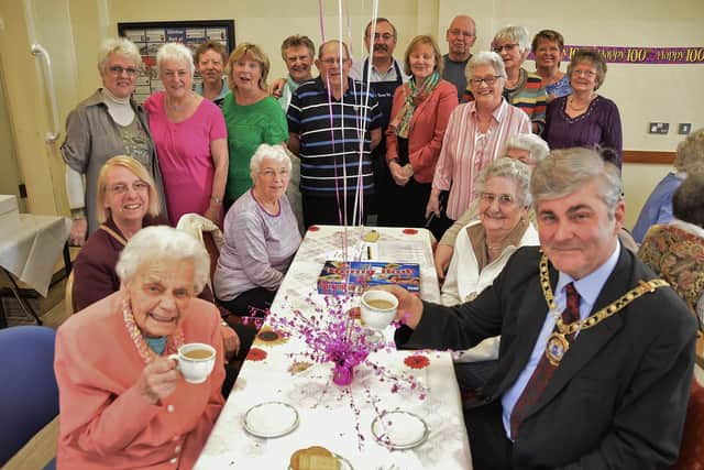 Win Vine at her 100th birthday party, attended by Mayor David Over.